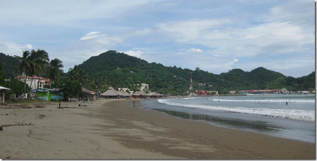 a view of the beach and reastuarnts in San Juan Del Sur